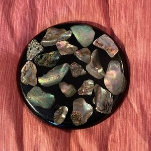 Vintage abalone shell trivet or hotplate sits per level!